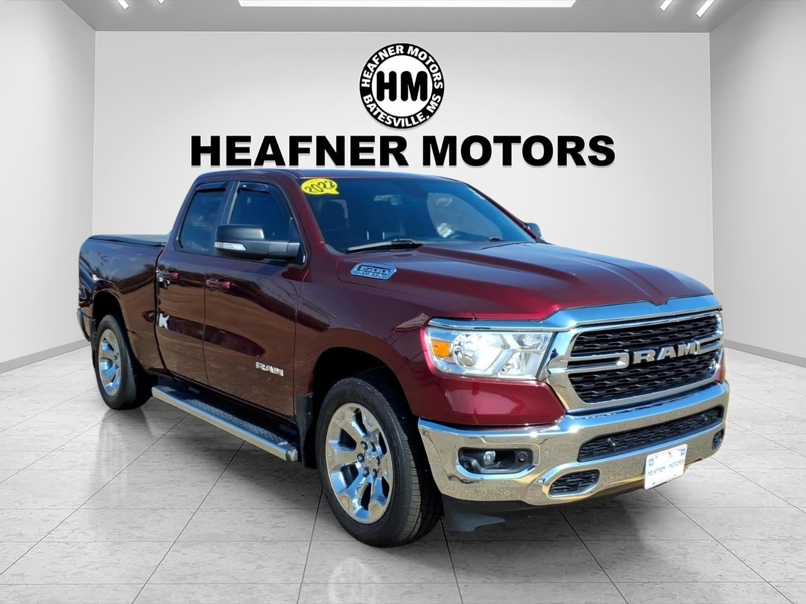 2022 RAM 1500 Big Horn Quad Cab 2WD in Maroon — front three-quarter view