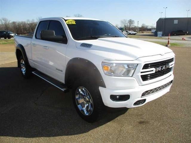 2019 RAM 1500 Big Horn Quad Cab 4WD in White — front three-quarter view
