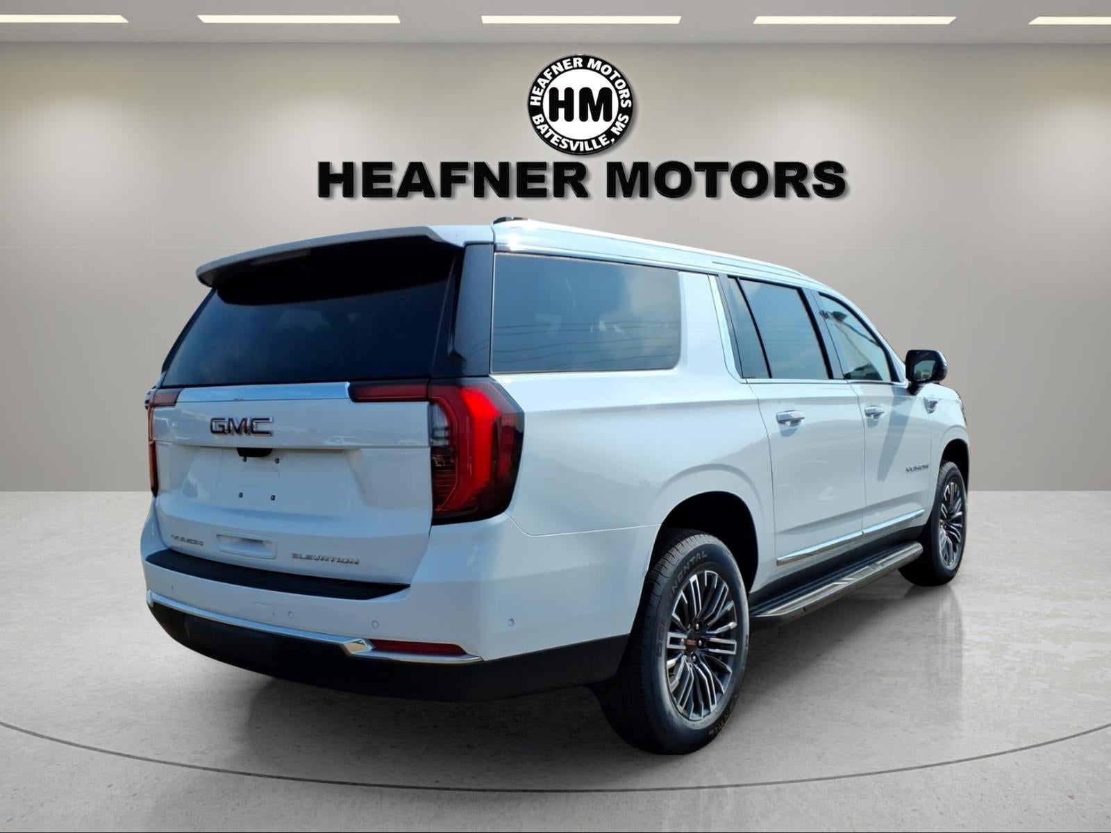 2026 GMC Yukon XL — rear three-quarter view