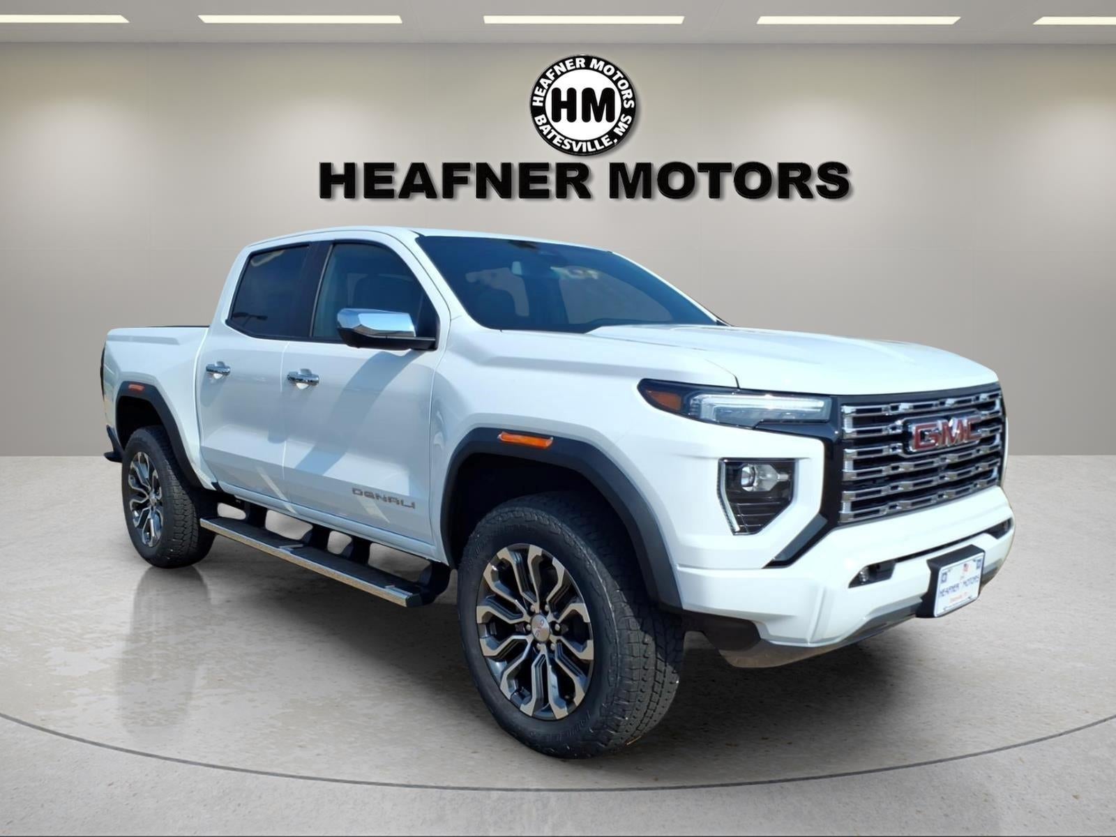 2026 GMC Canyon Denali in Summit White — front three-quarter view