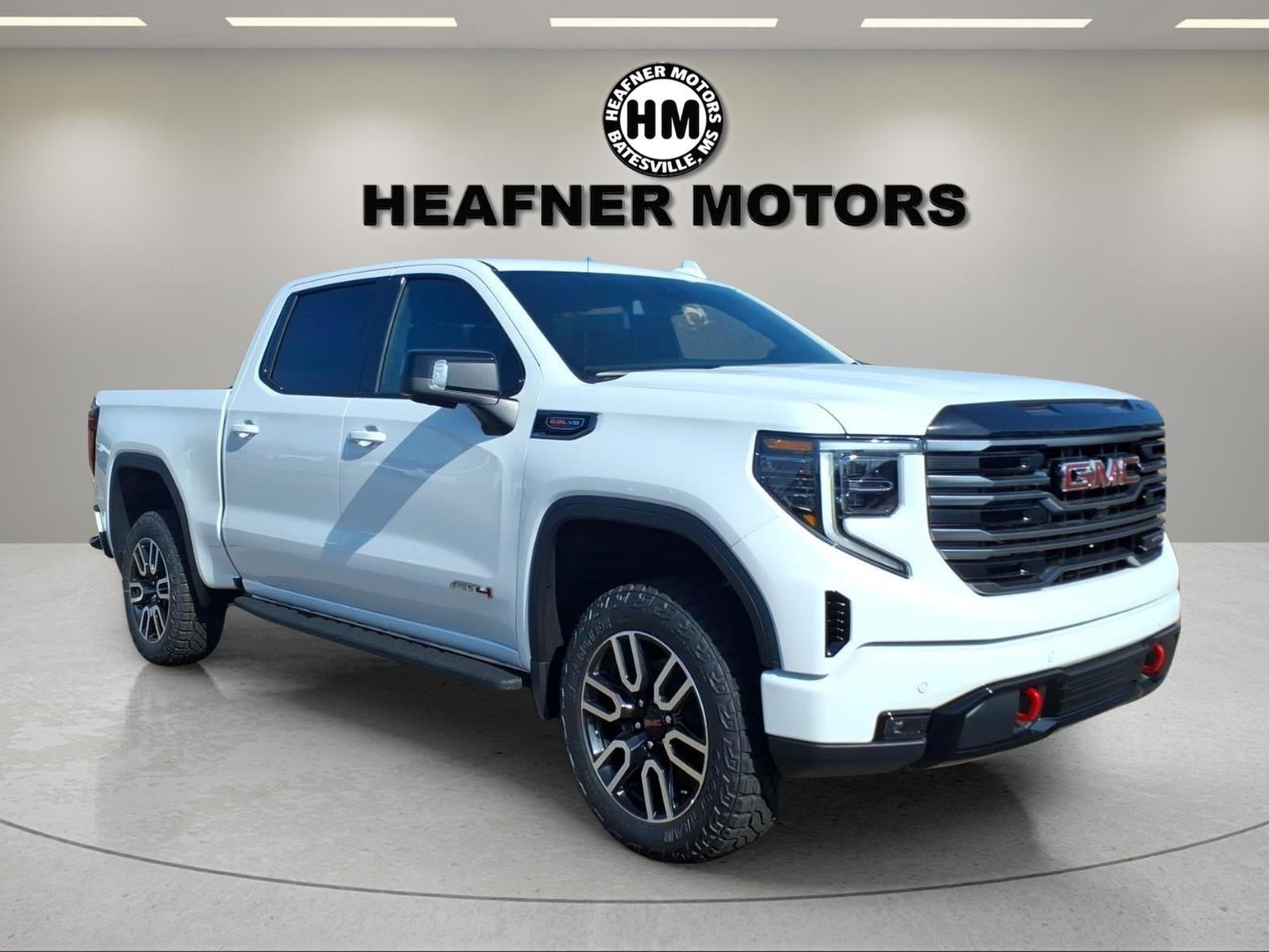 2026 GMC Sierra 1500 AT4 in Summit White — front three-quarter view