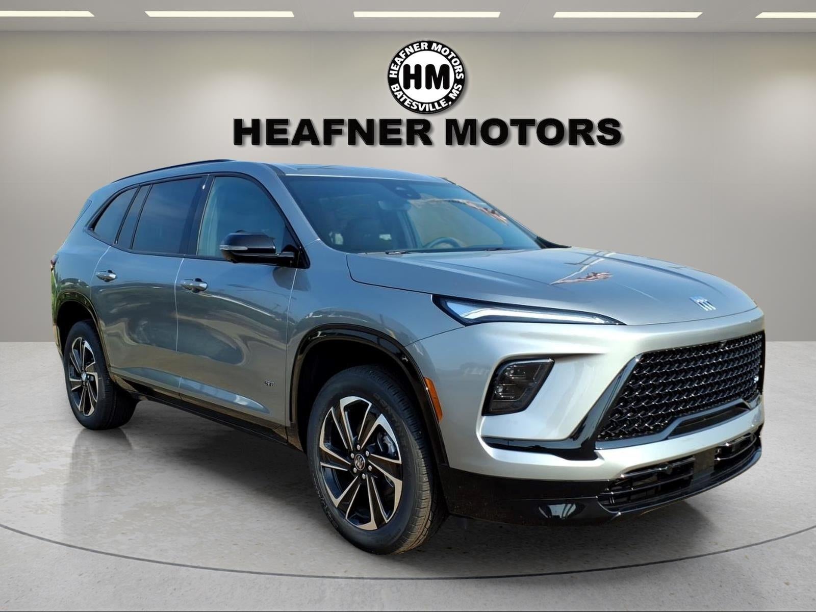 2026 Buick Enclave Sport Touring in Moonstone Gray Metallic — front three-quarter view