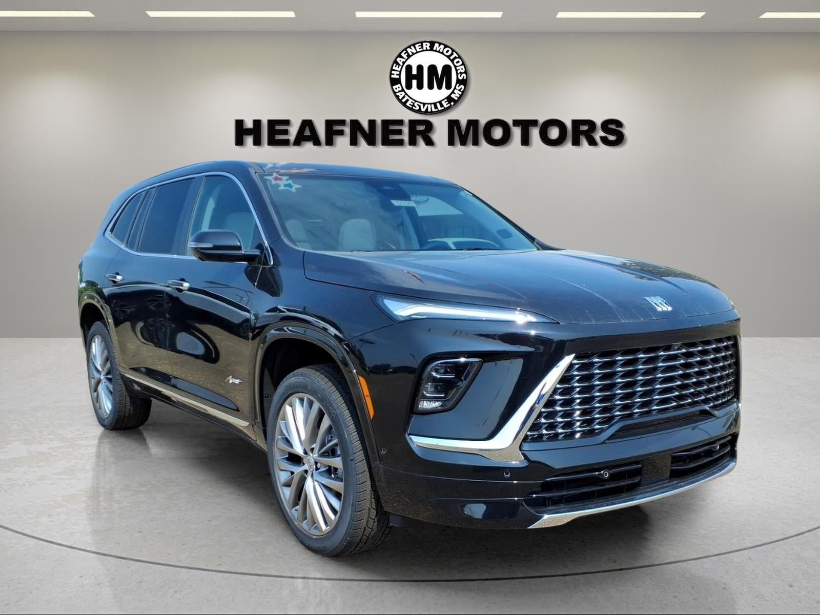 2026 Buick Enclave Avenir in Ebony Twilight Metallic — front three-quarter view