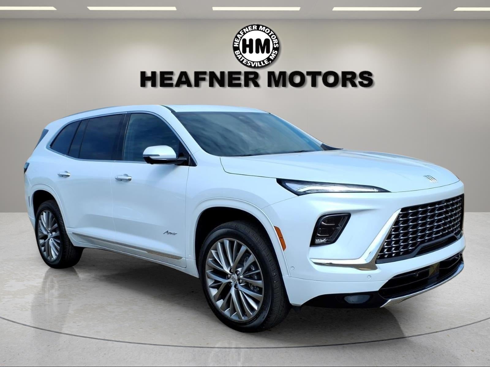 2026 Buick Enclave Avenir in Iridescent White Tricoat — front three-quarter view