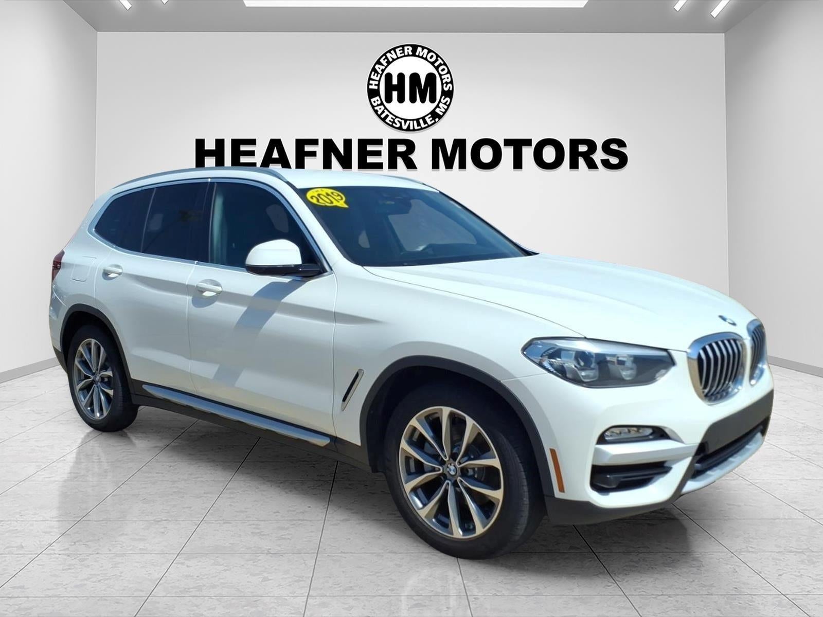 2019 BMW X3 sDrive30i in White — front three-quarter view