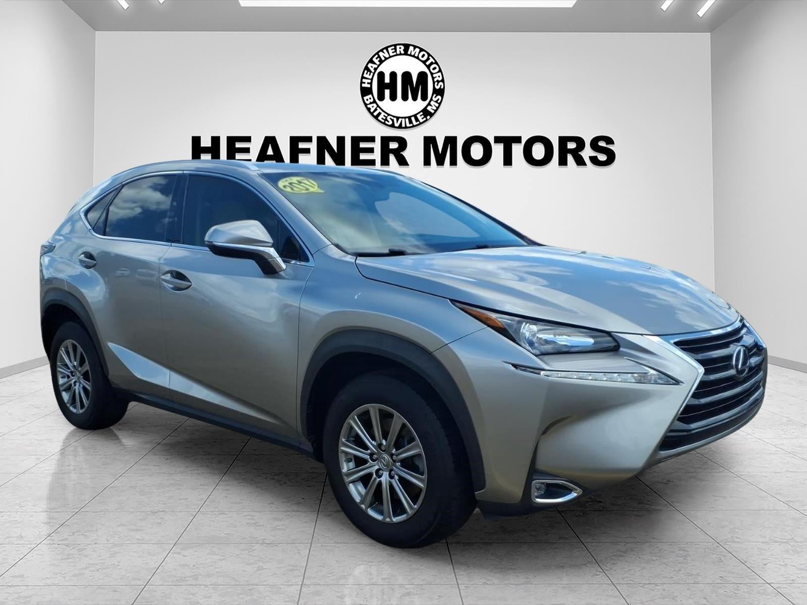2017 Lexus NX FWD in Gold — front three-quarter view
