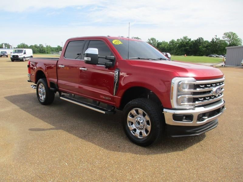 2024 Ford F-350 SD Lariat Crew Cab Short Bed 4WD in Maroon — front three-quarter view