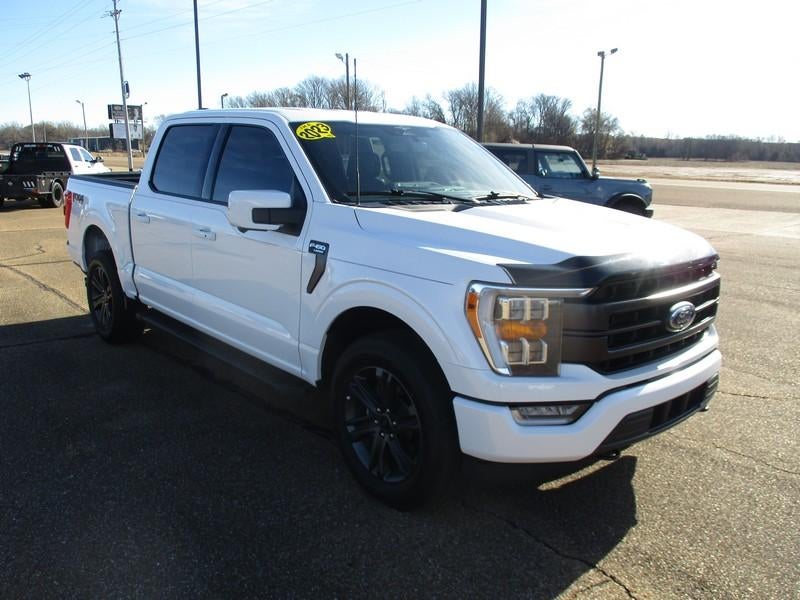 2023 Ford F-150 Lariat SuperCrew 5.5-ft. Bed 4WD in White — front three-quarter view
